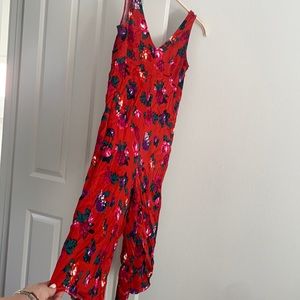 Anthropologie jumpsuit - red/orange floral, size S, tags still on